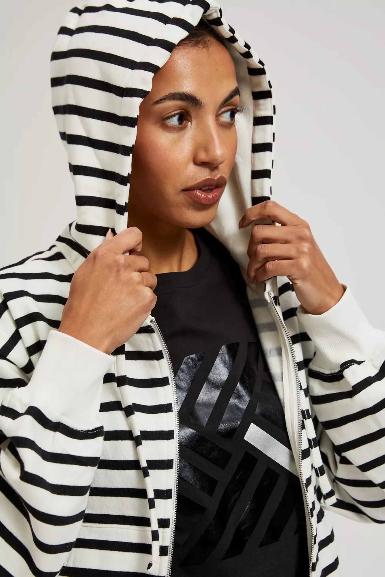 White sweatshirt with black stripes