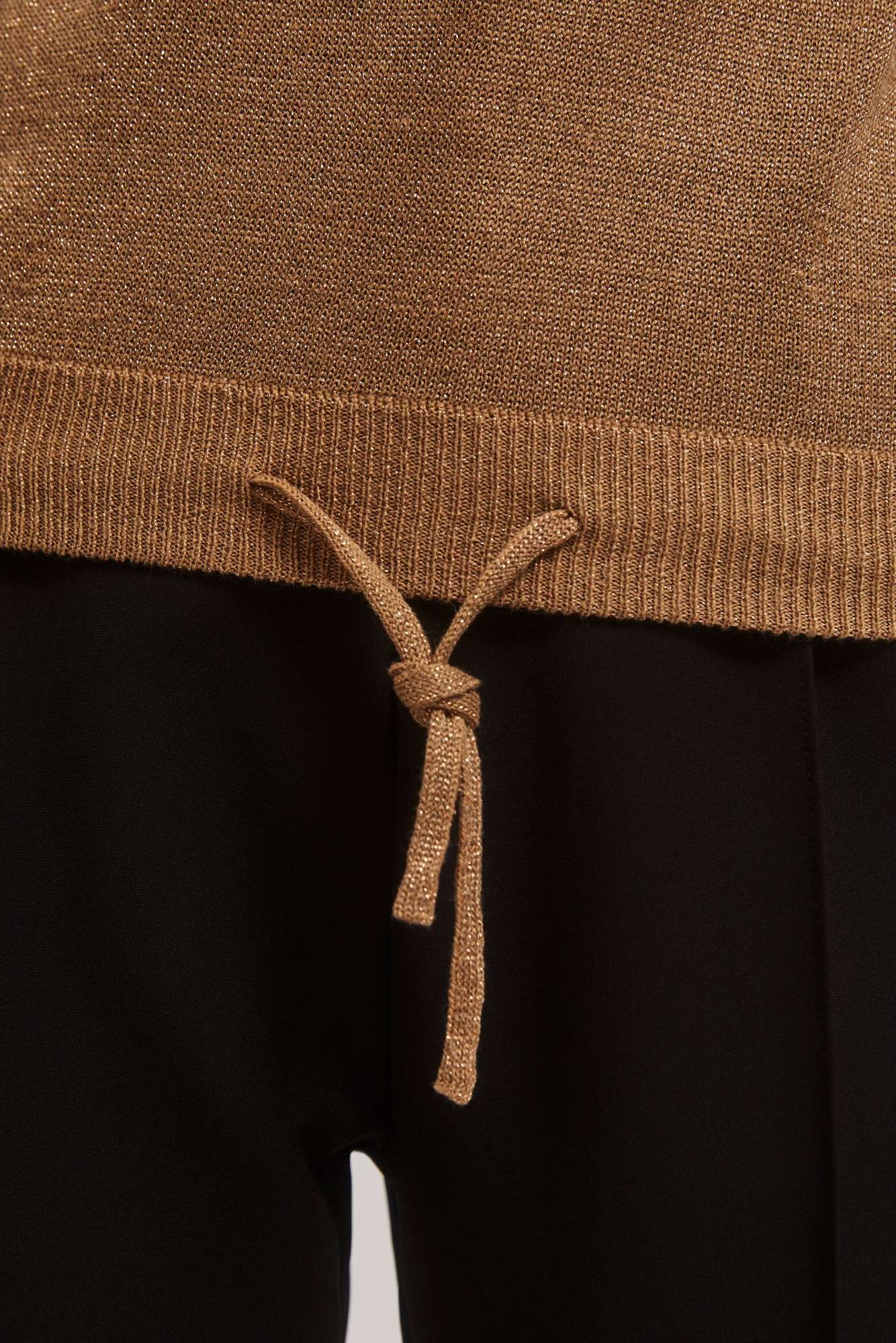 Sweater with metal thread and tie-up