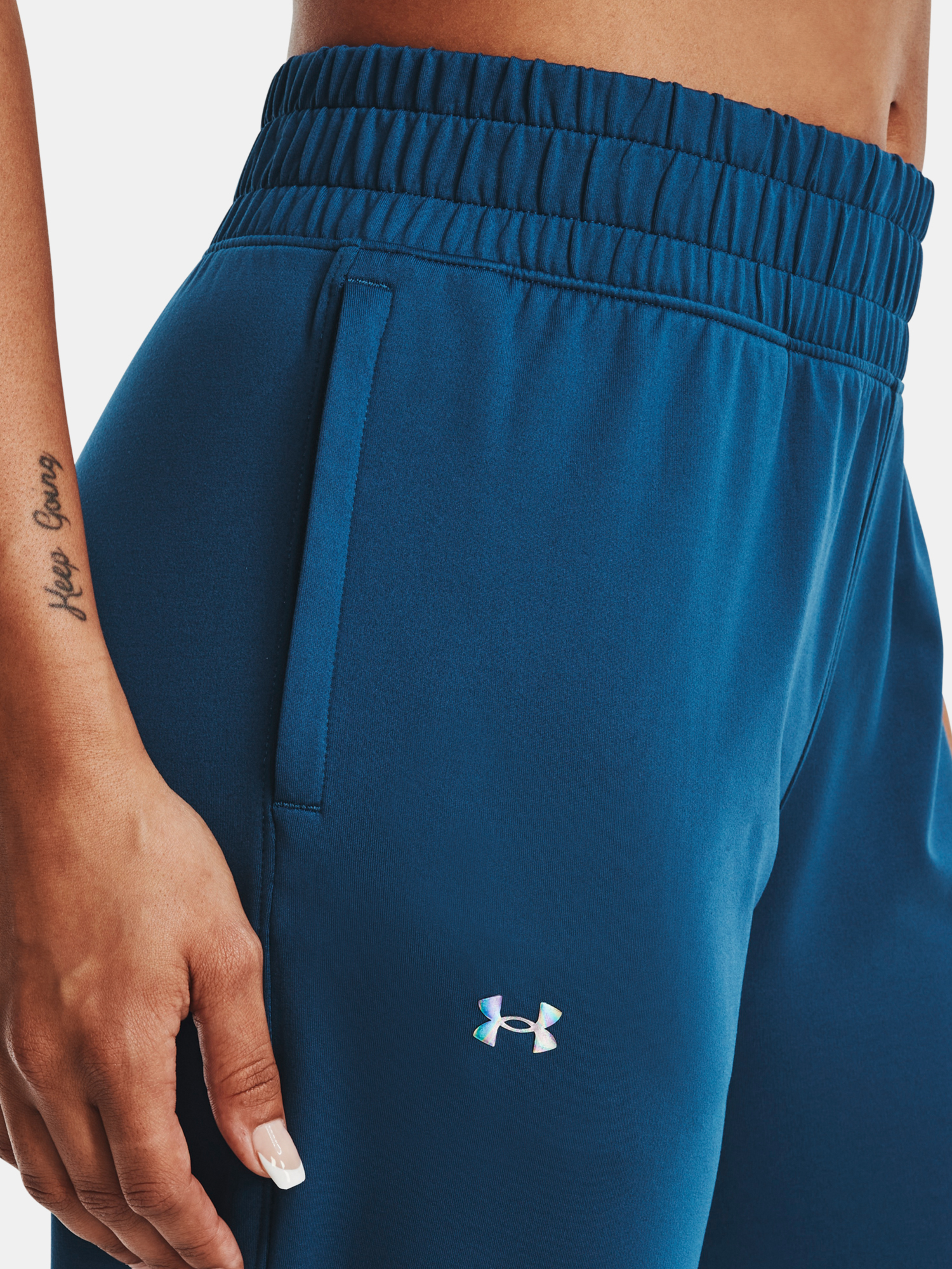 Pantaloni si pantaloni scurti pentru femei Under Armour - albastru