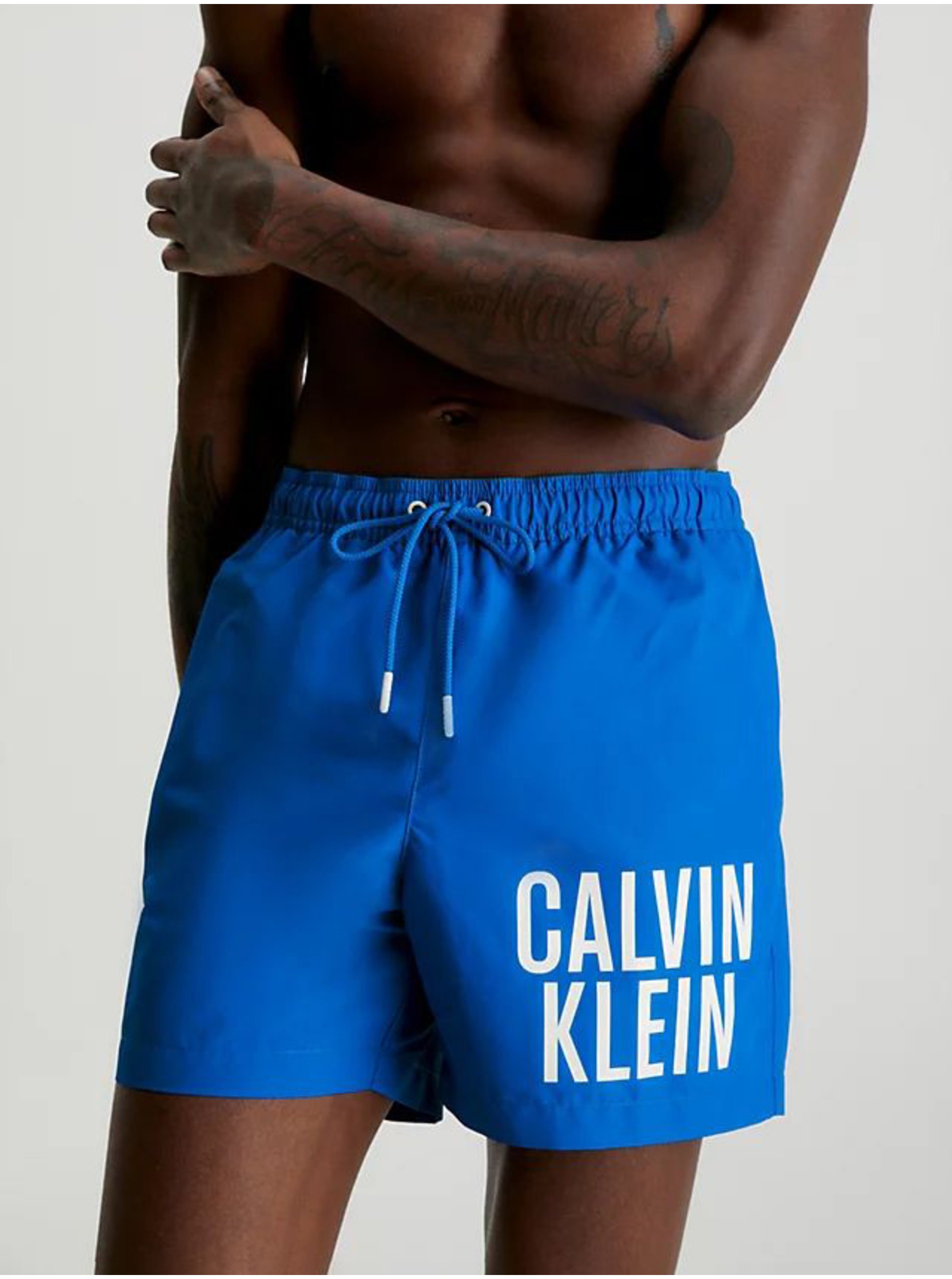 Modré pánské plavky Calvin Klein Underwear - Pánské