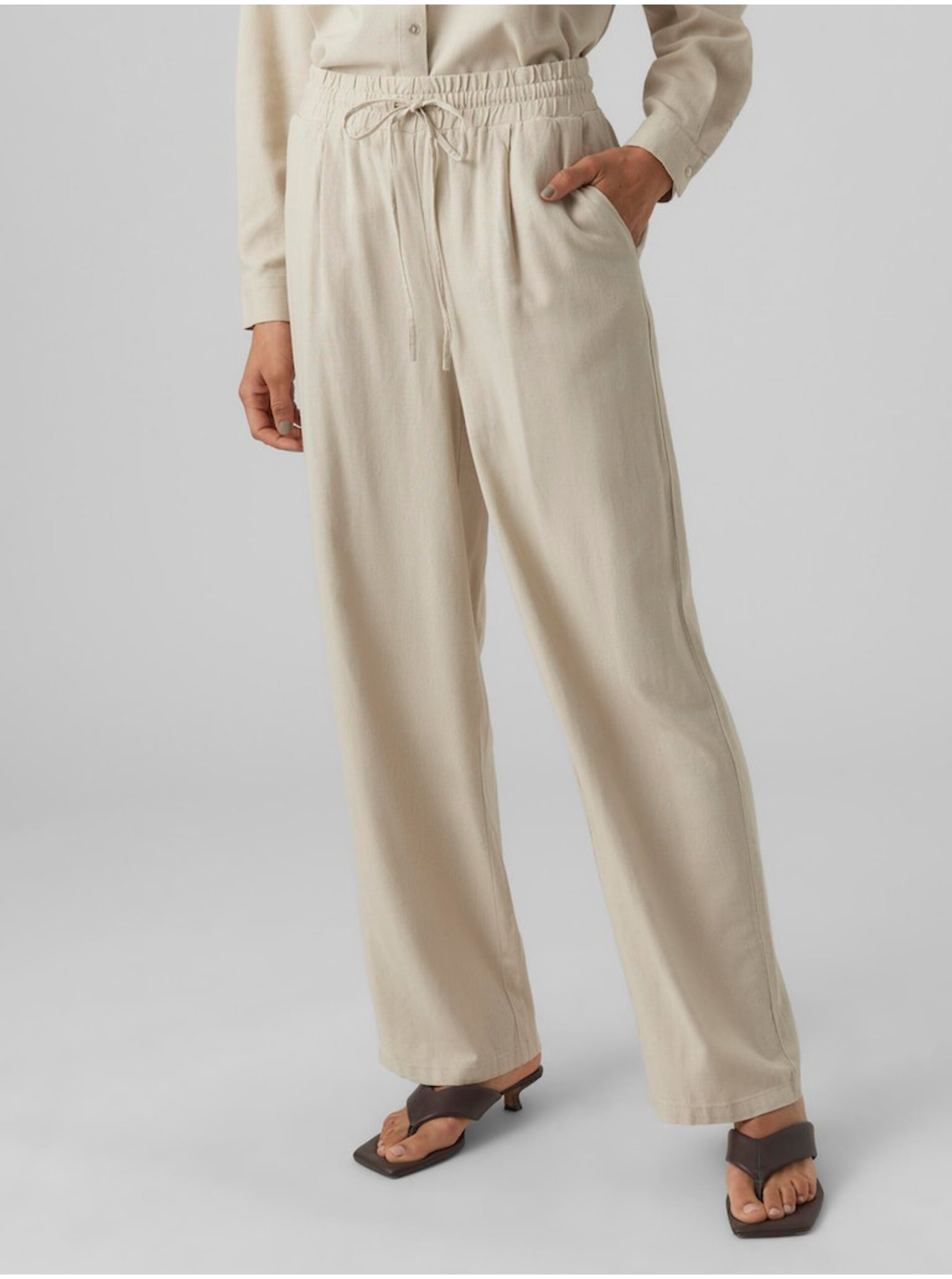 Levně Krémové dámské kalhoty s příměsí lnu Vero Moda Jesmilo - Dámské