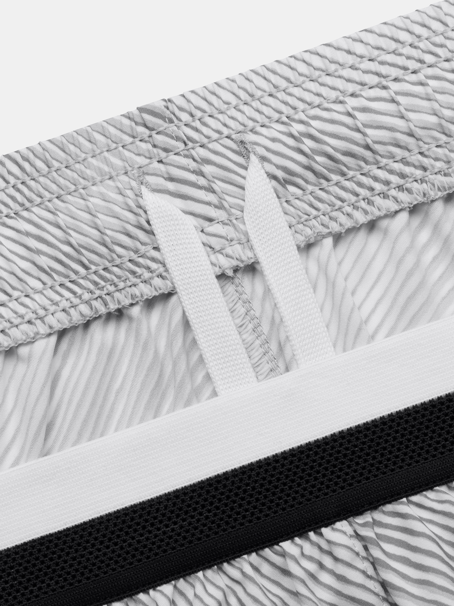Pantaloni si pantaloni scurti pentru femei Under Armour - gri deschis