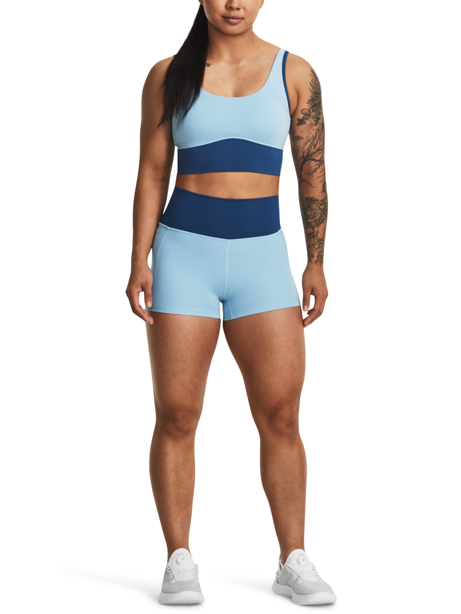 Pantaloni si pantaloni scurti pentru femei Under Armour - albastru deschis, albastru