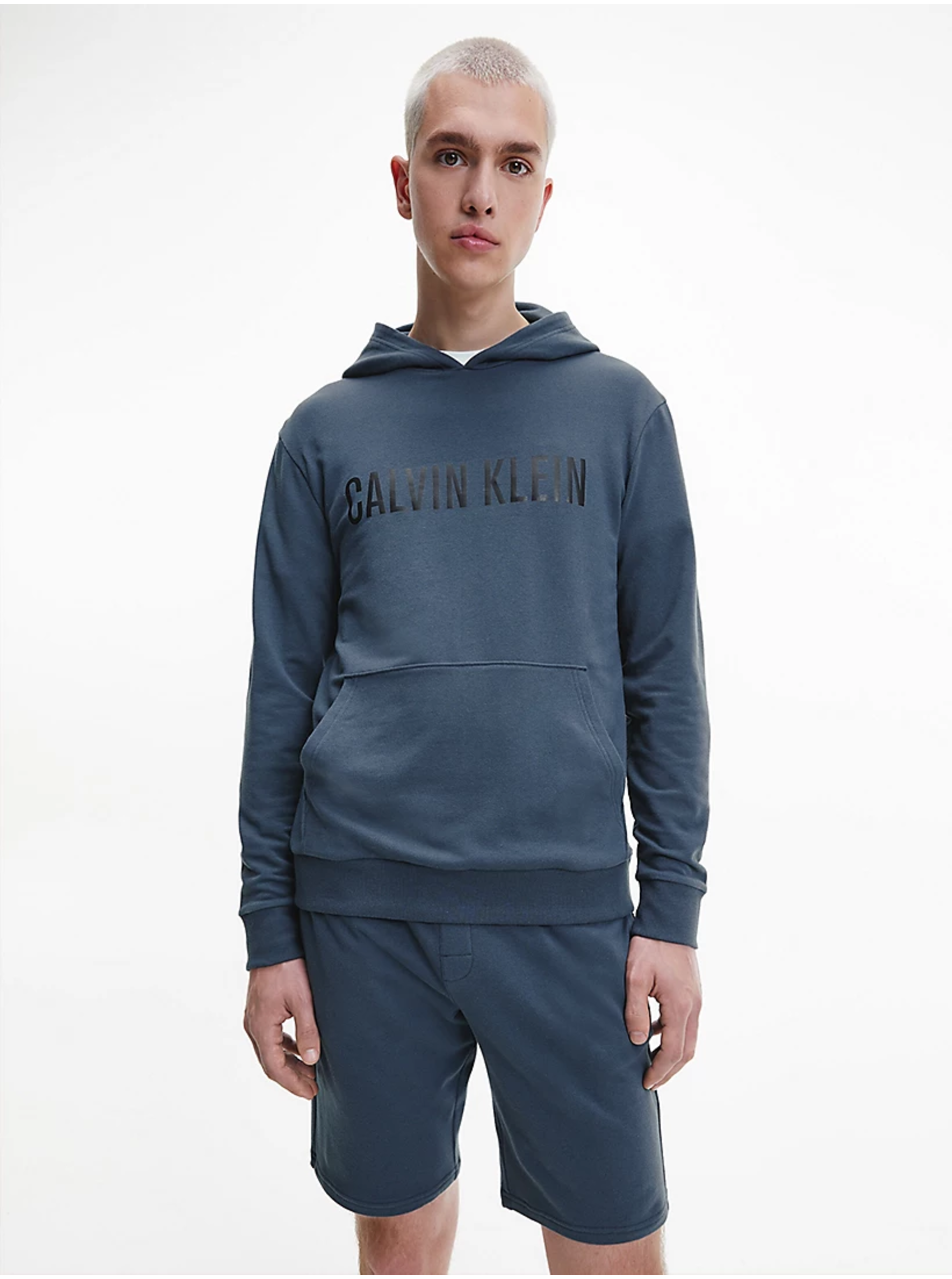 Levně Šedomodrá pánská mikina s kapucí Calvin Klein Jeans - Pánské