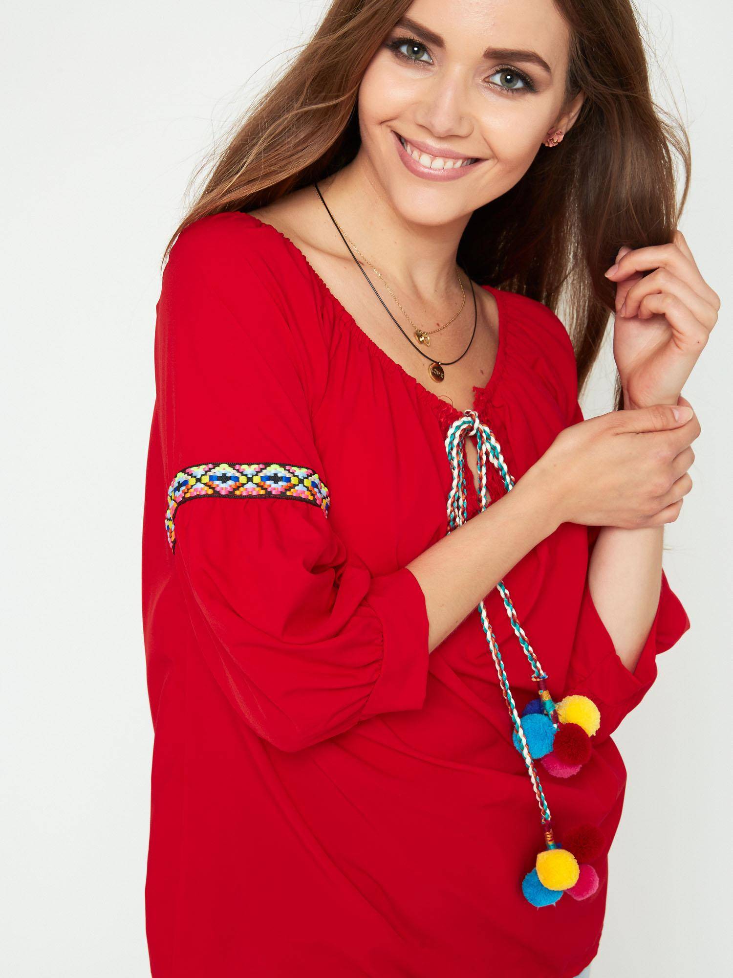 Blouse with decorative binding red