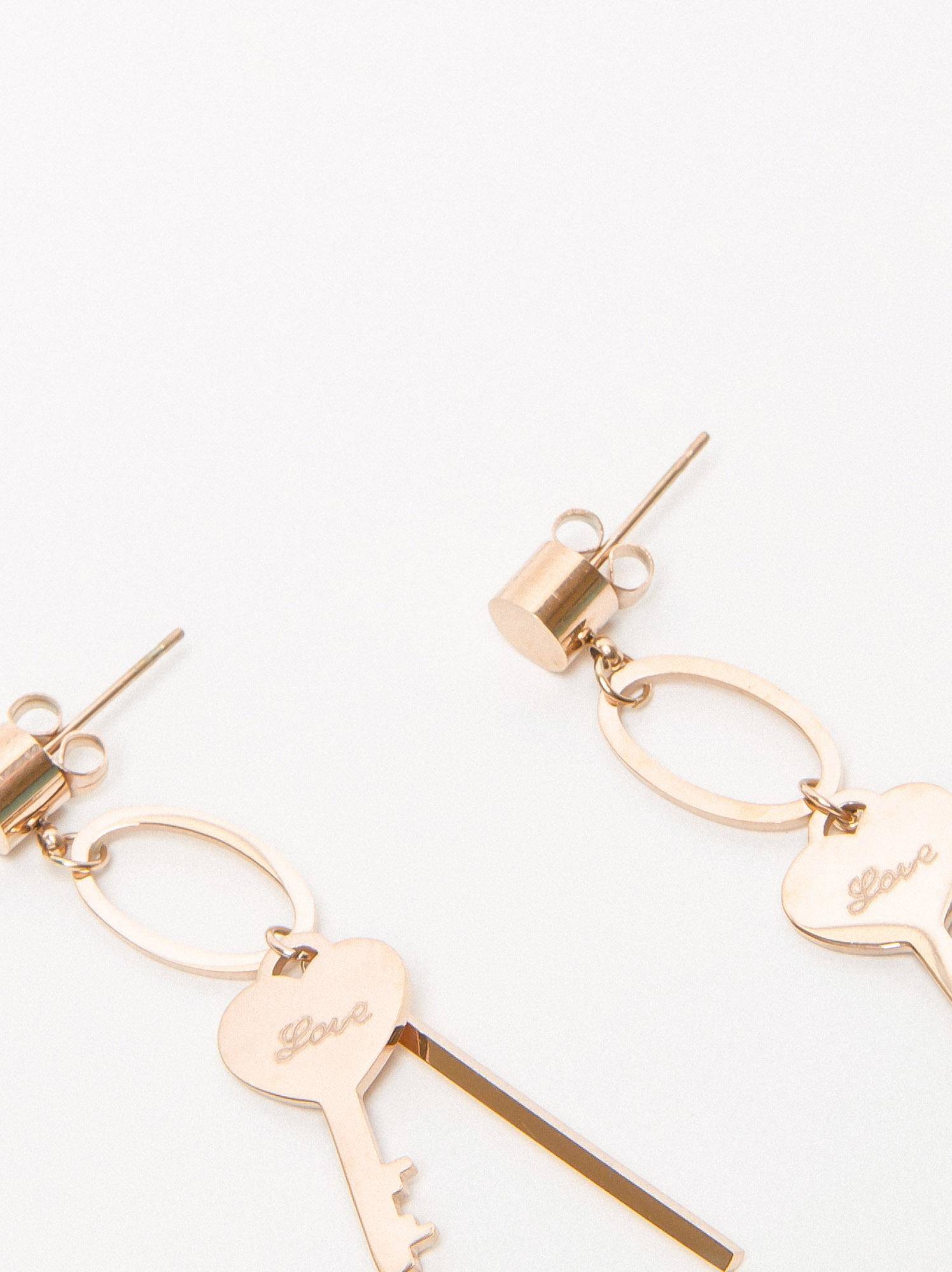 Earrings hanging gold key
