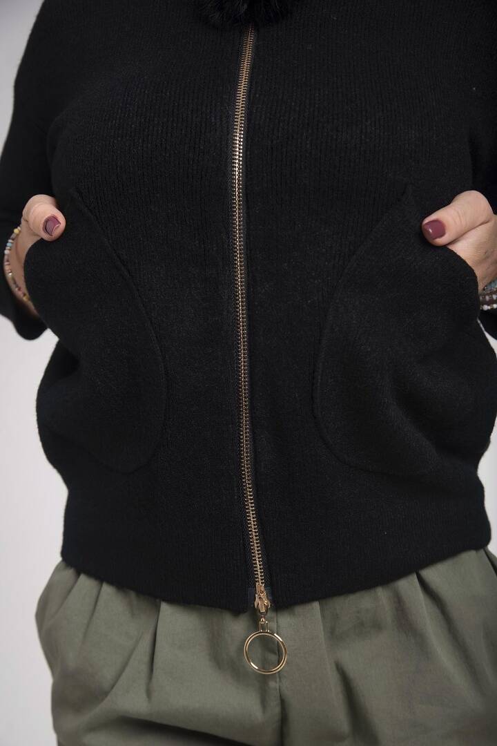 Black soft sweater with zipper closure
