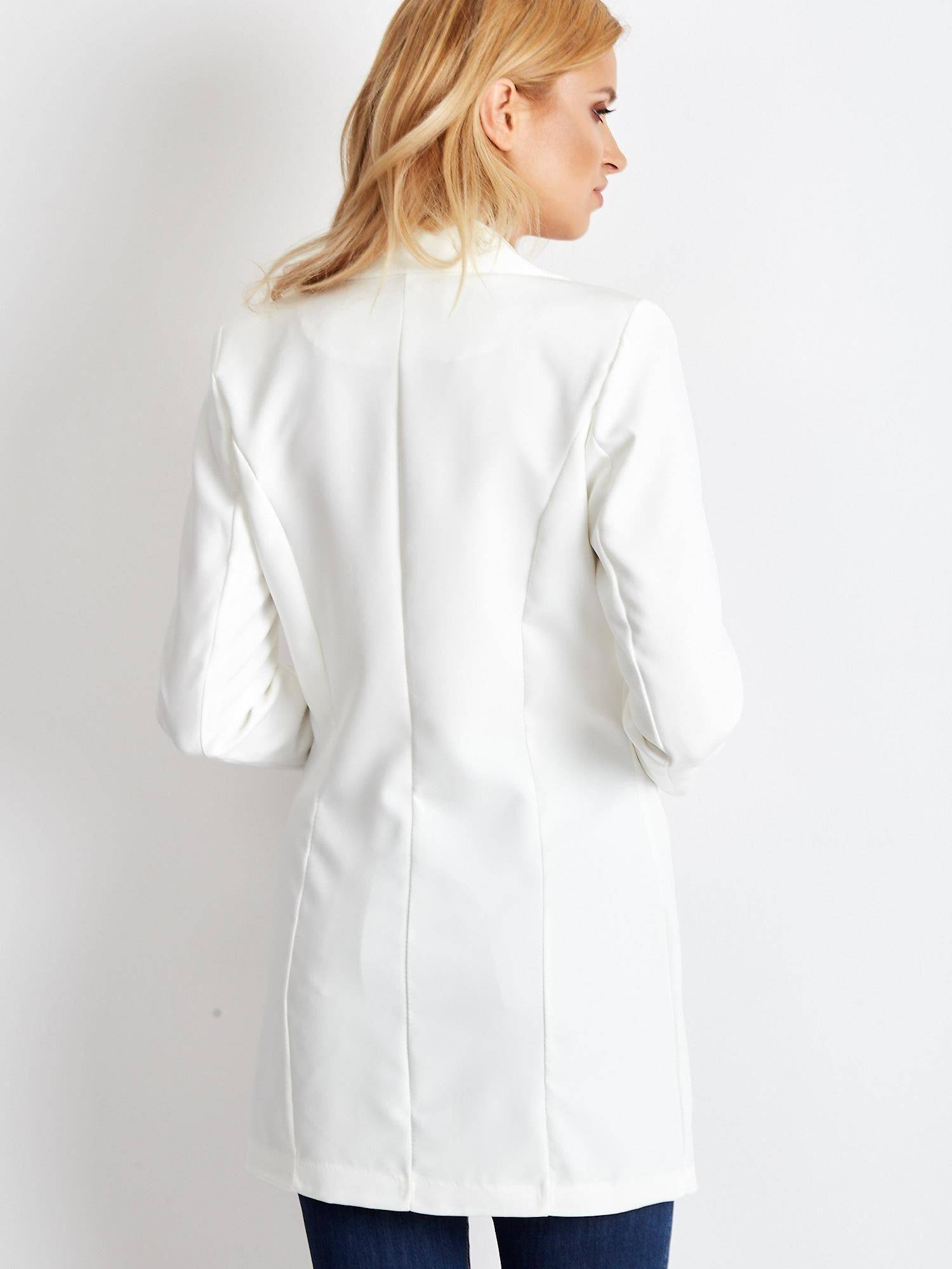 Long jacket decorated with gold ecru buttons