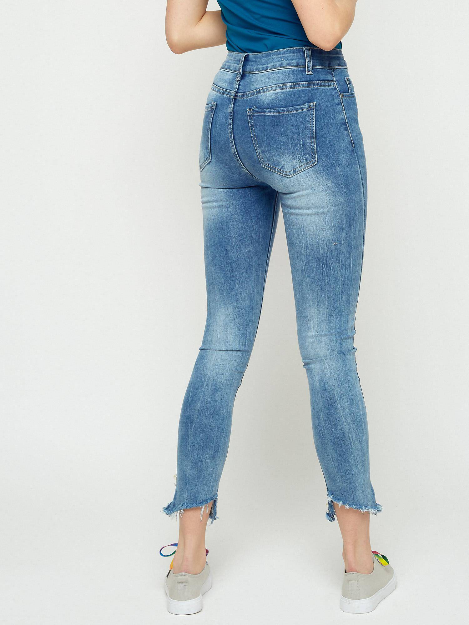 Jeans decorated with abrasions and pearls blue