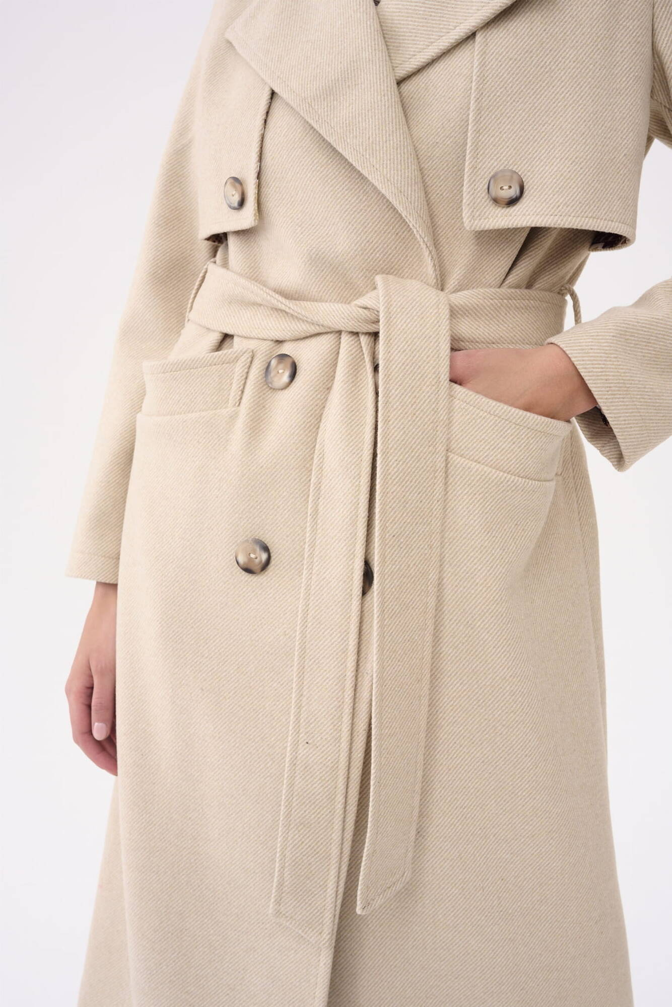 Beige double-breasted coat with Blue Shadow belt