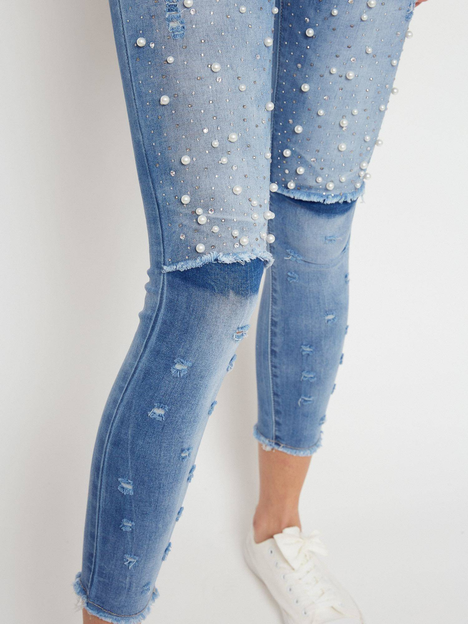 Denim jeans decorated with pearls and rhinestones blue