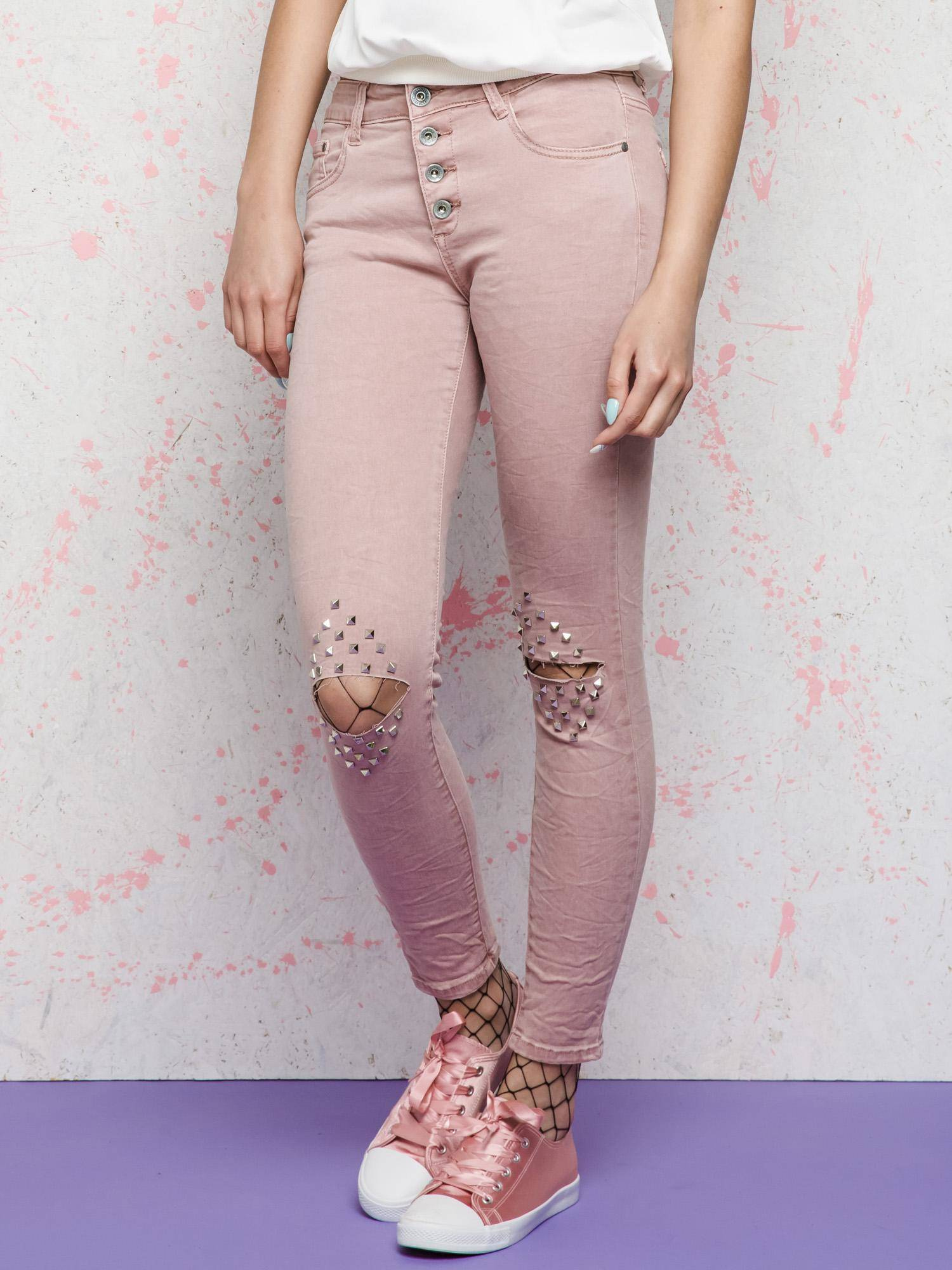 Euphora jeans decorated with cuts and rhinestones on the knees pink