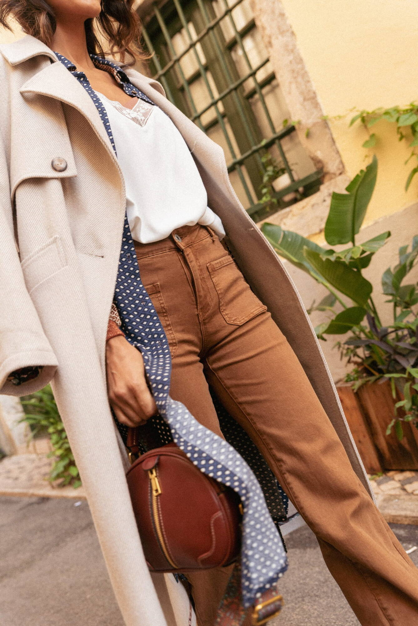 Beige double-breasted coat with Blue Shadow belt