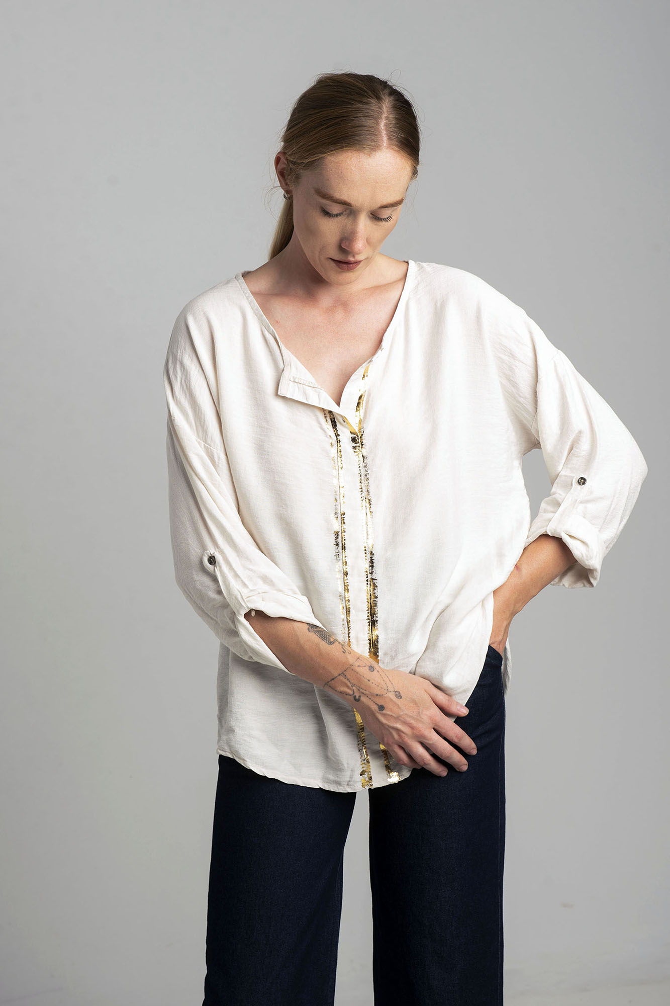 Ecru blouse with gold print