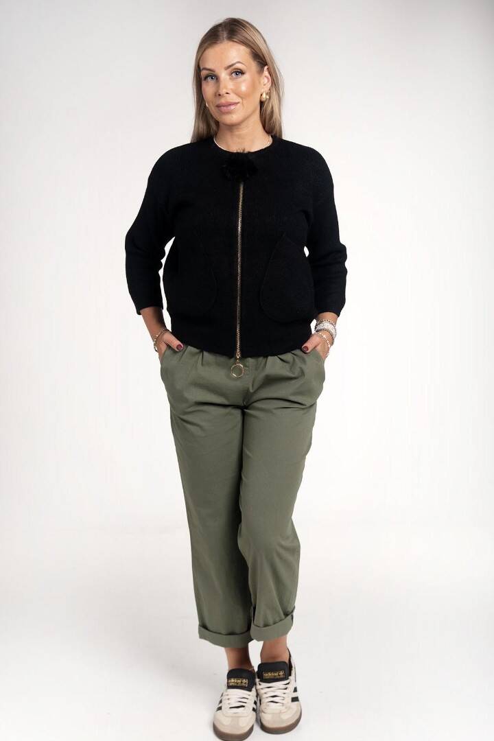 Black soft sweater with zipper closure