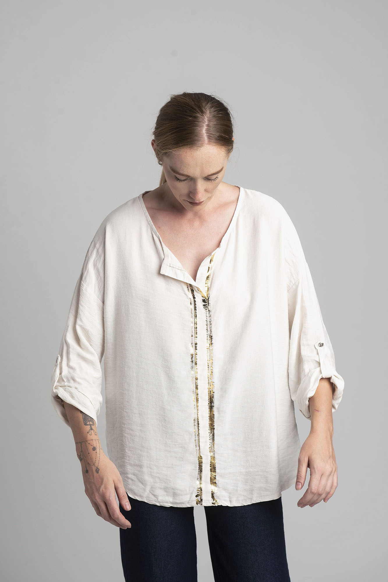 Ecru blouse with gold print