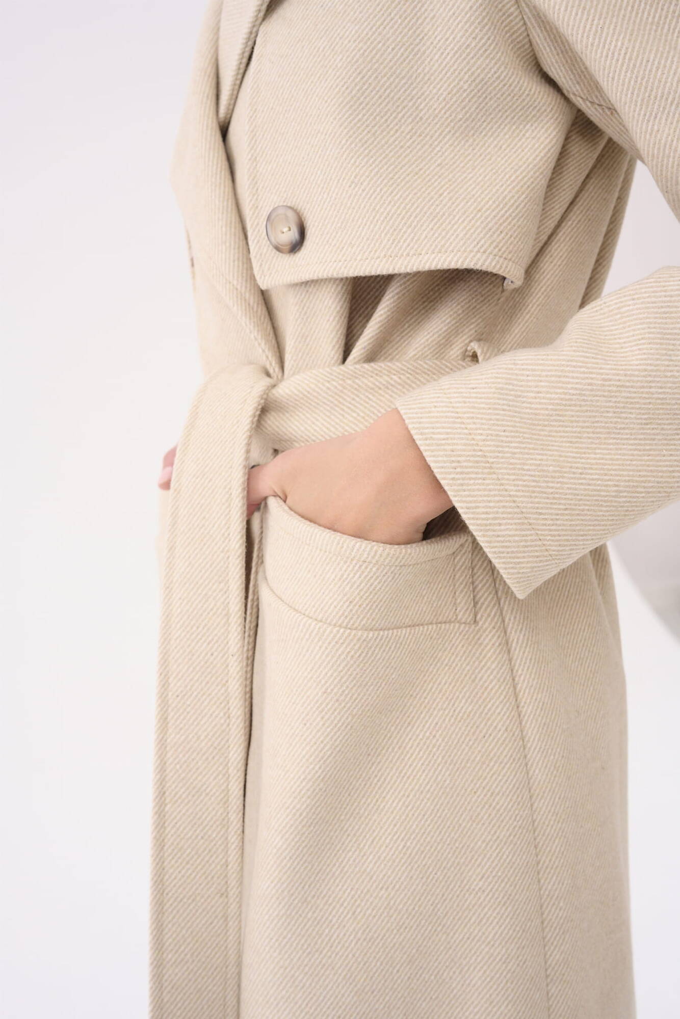Beige double-breasted coat with Blue Shadow belt