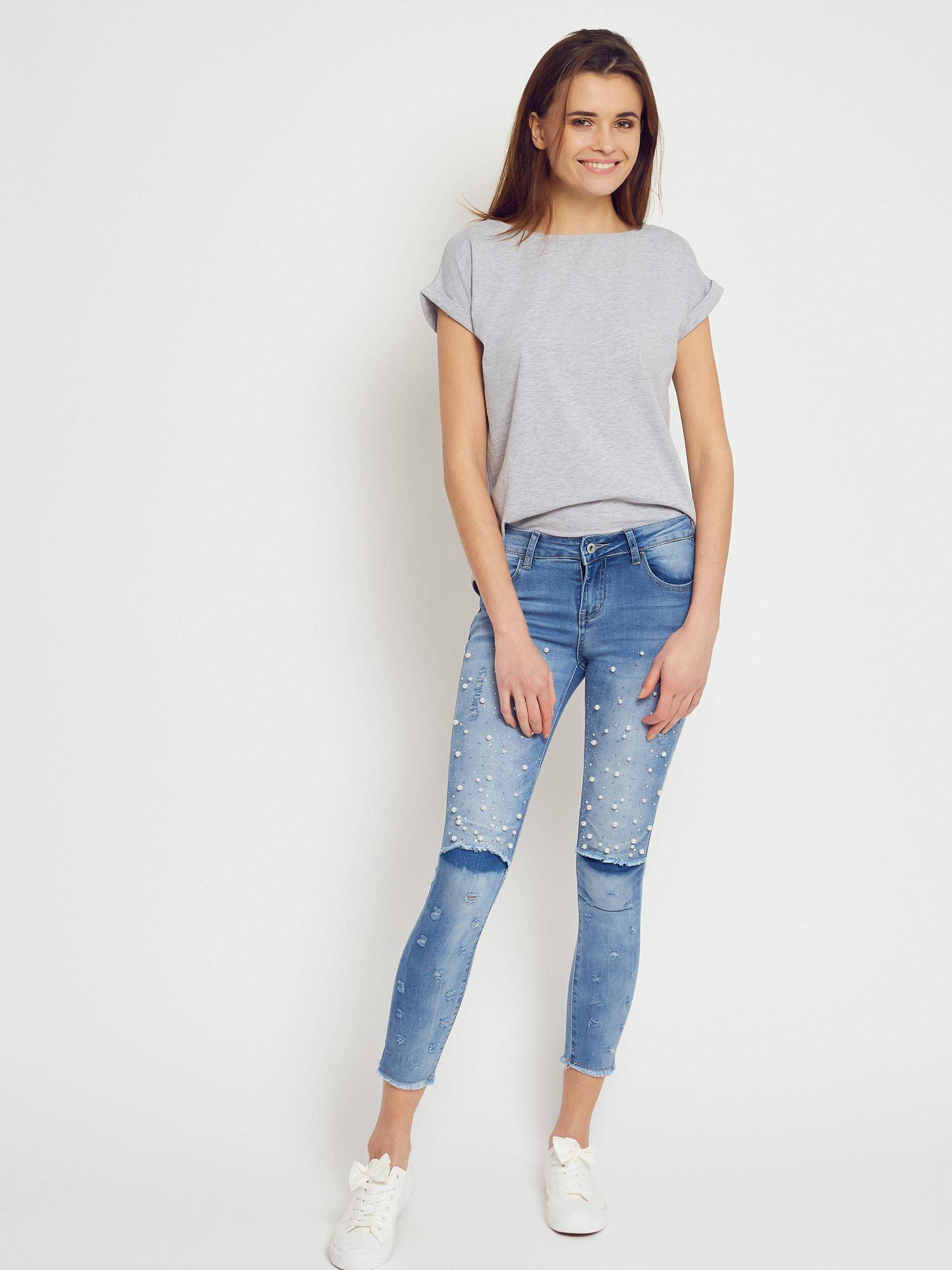 Denim jeans decorated with pearls and rhinestones blue