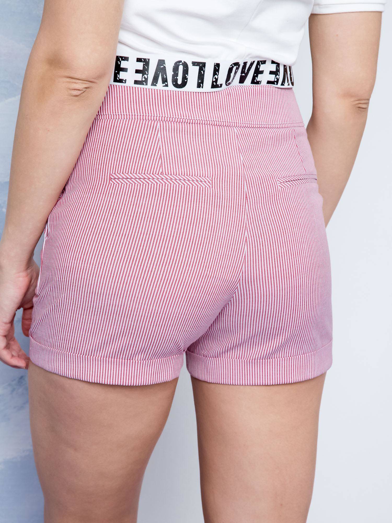 Lemonade shorts with rolled up legs red