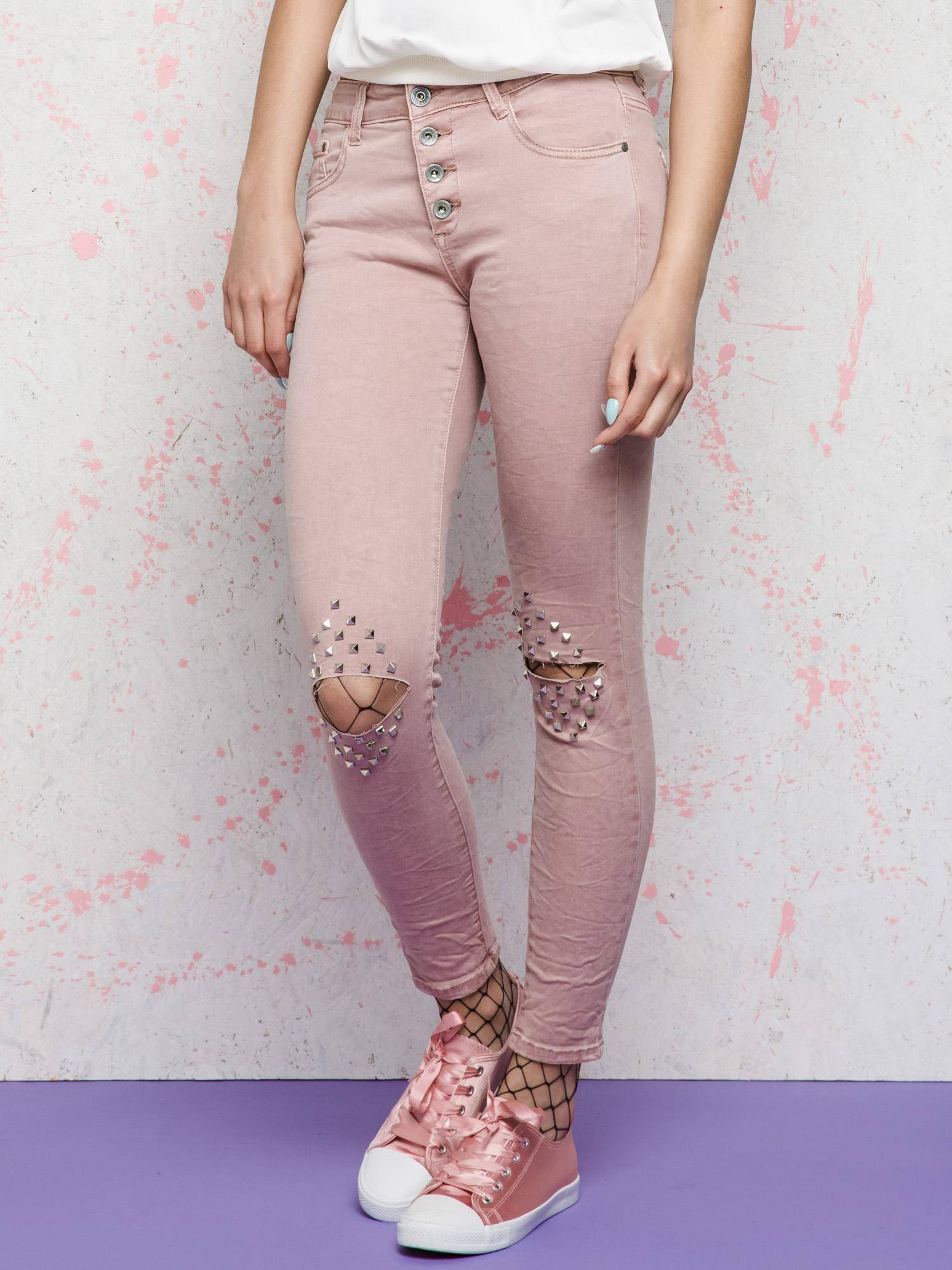 Euphora jeans decorated with cuts and rhinestones on the knees pink
