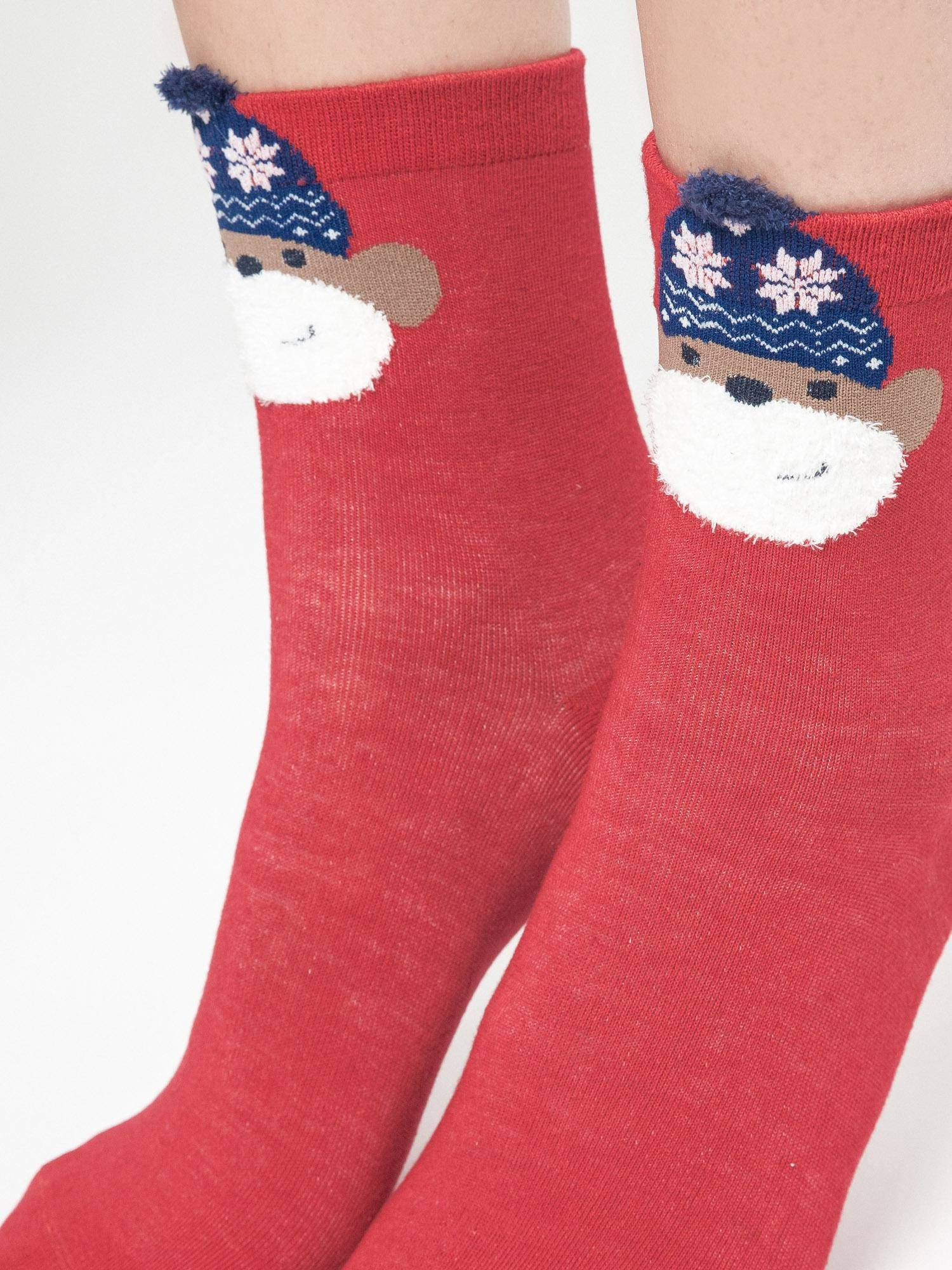 Socks with application monkey in a hat with red stars
