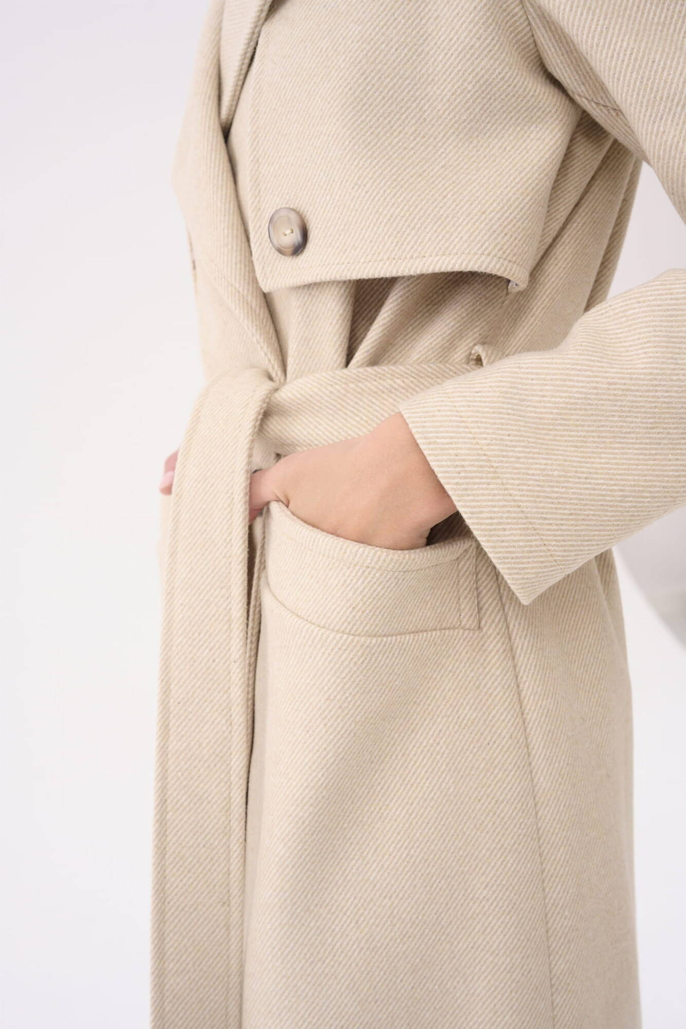 Beige double-breasted coat with Blue Shadow belt