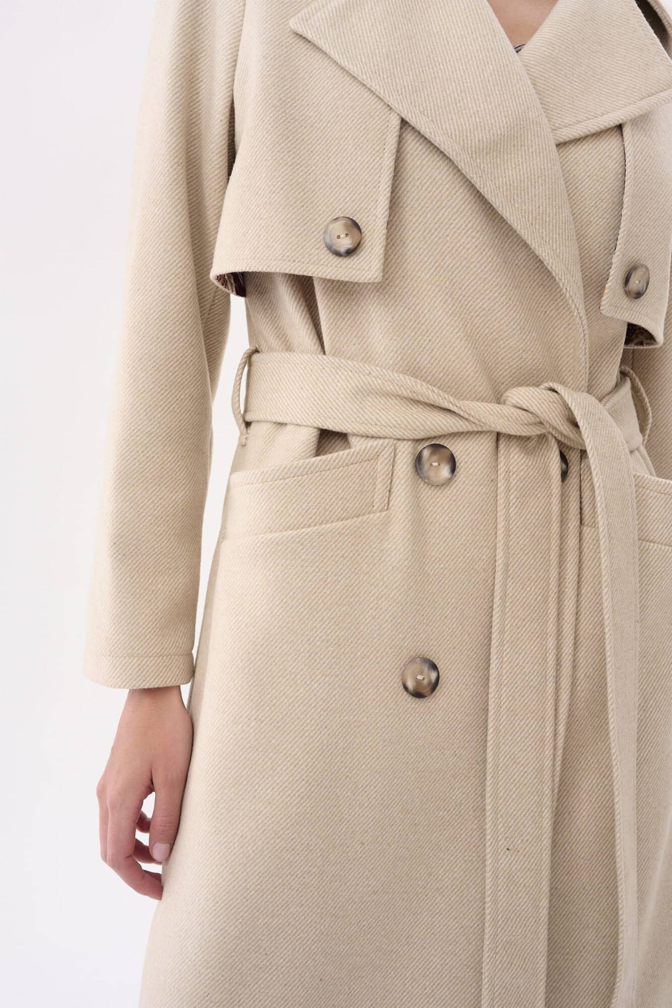 Beige double-breasted coat with Blue Shadow belt