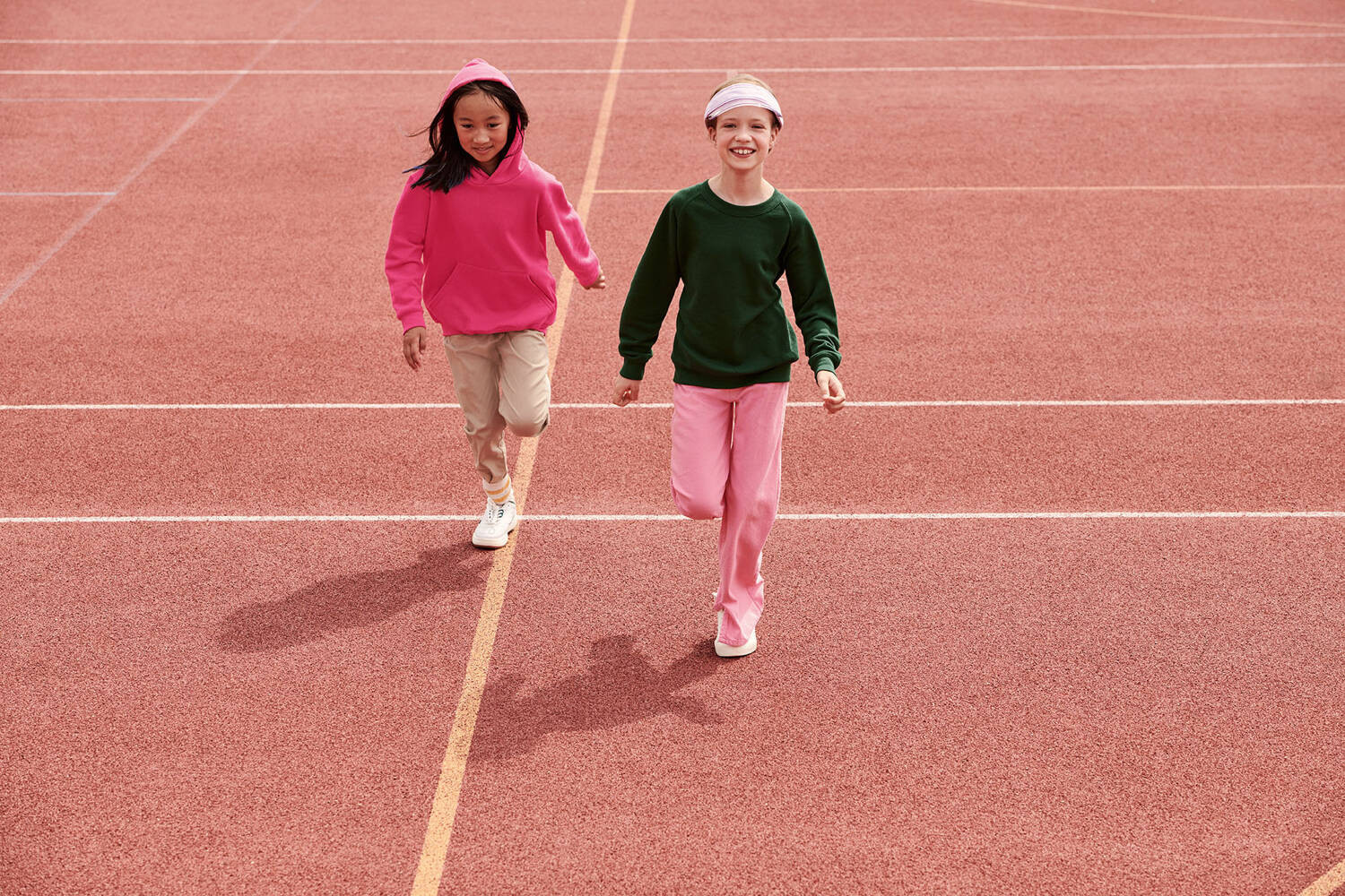 Pink children's sweatshirt Classic kangaroo Fruit of the Loom