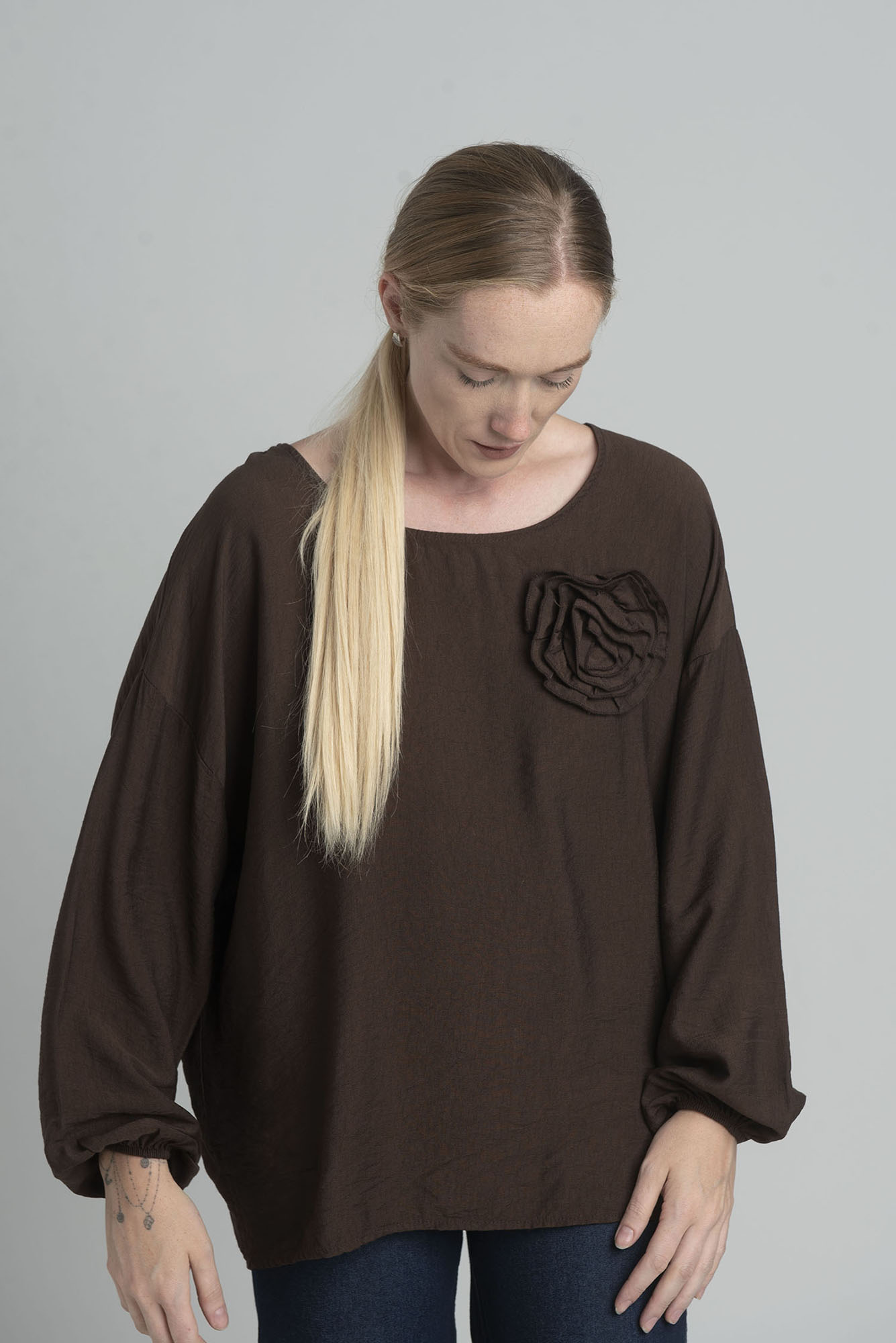 Oversized Chocolate Blouse With A Decorative Flower