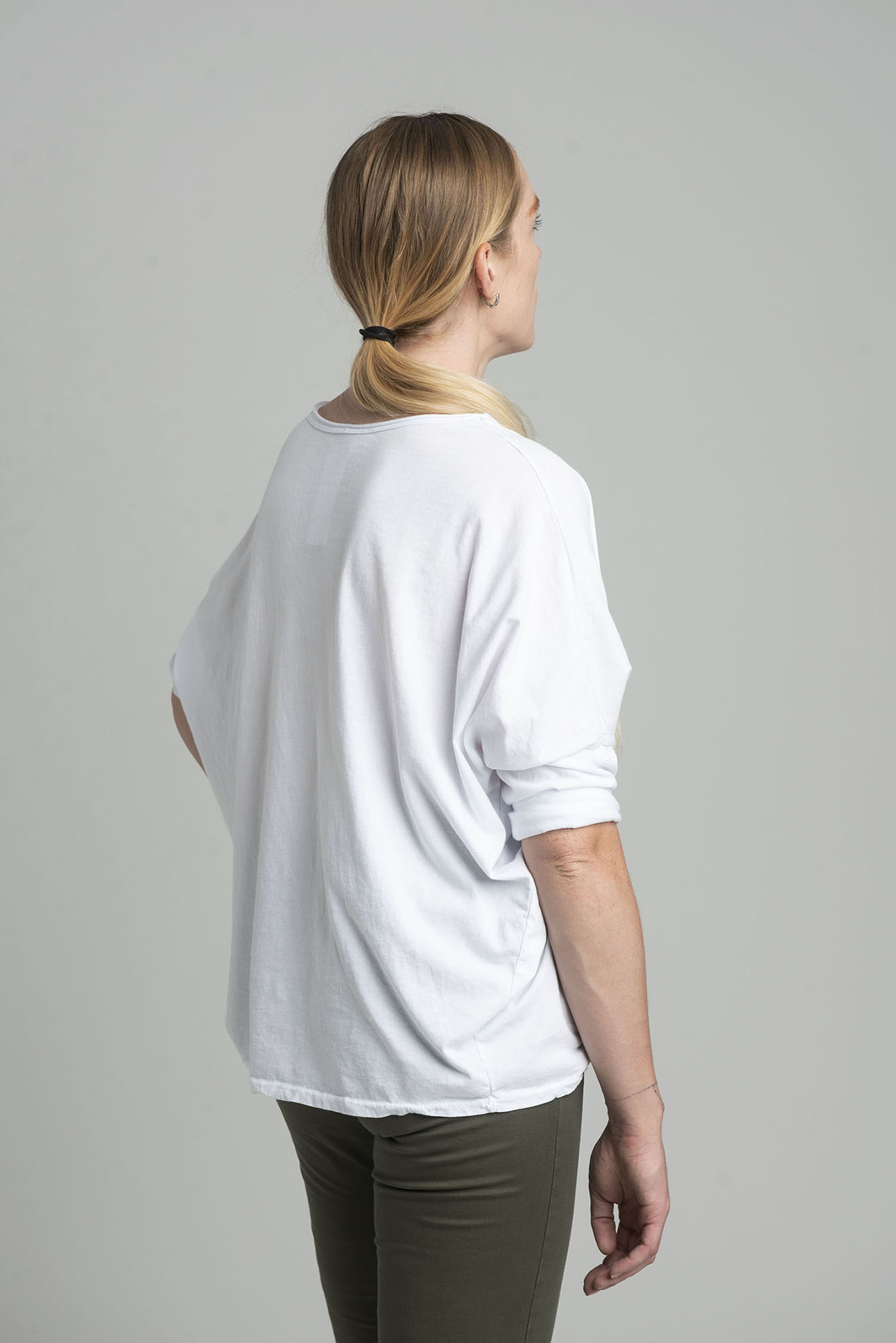 White oversize blouse with a shiny print