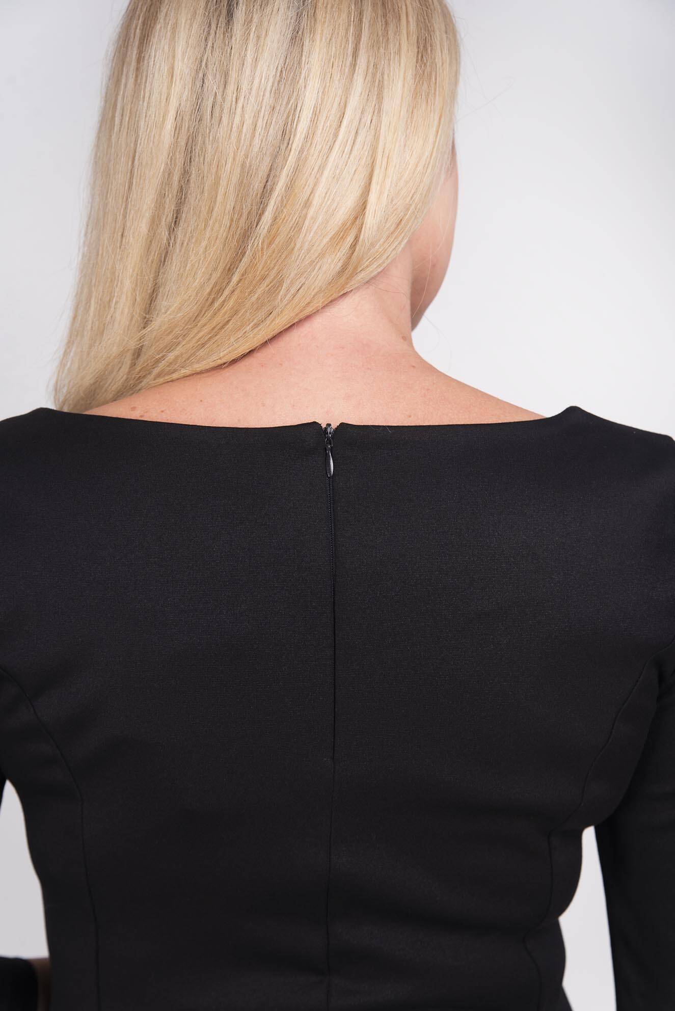 The black flared dress is ... Me