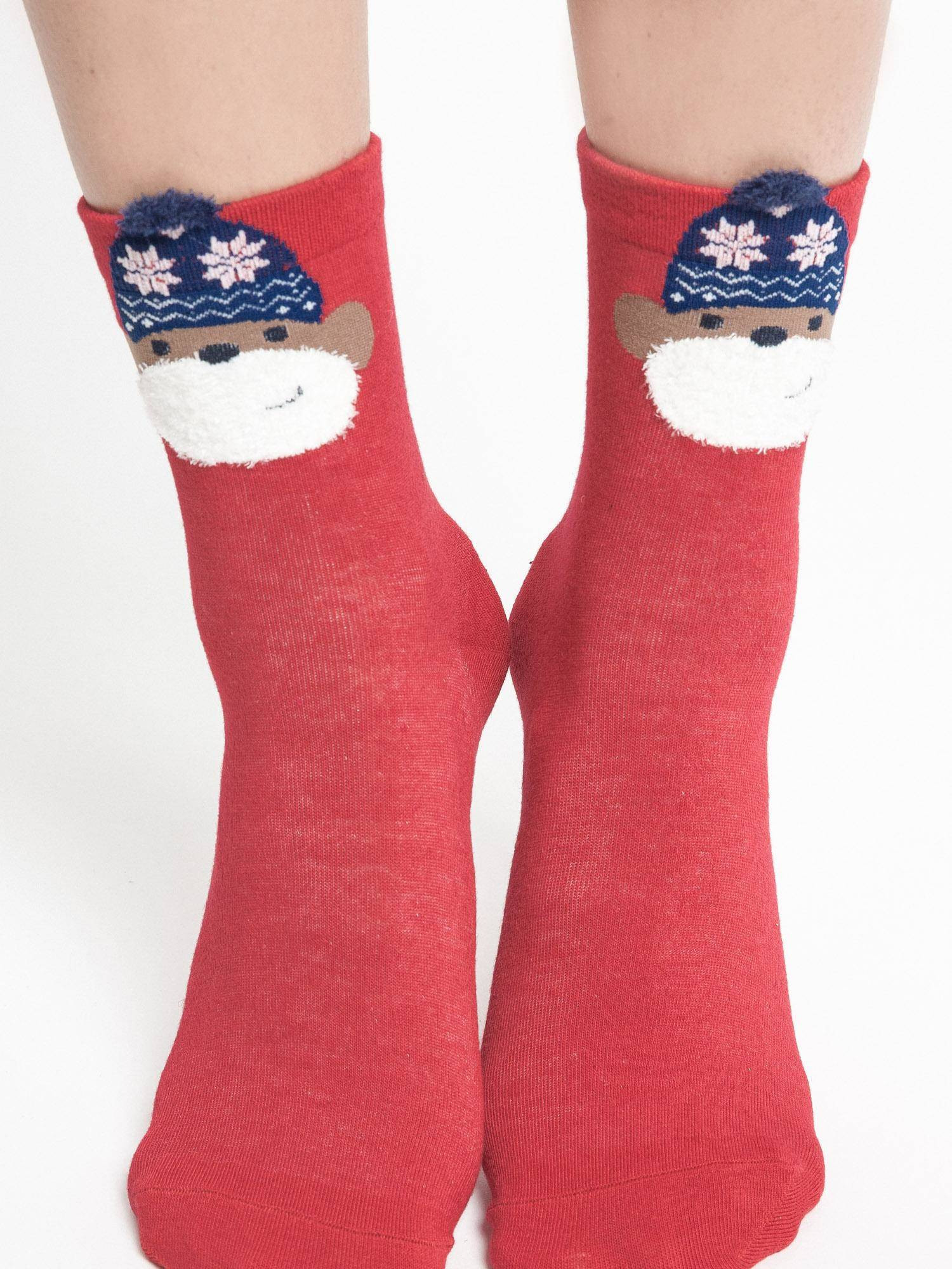 Socks with application monkey in a hat with red stars