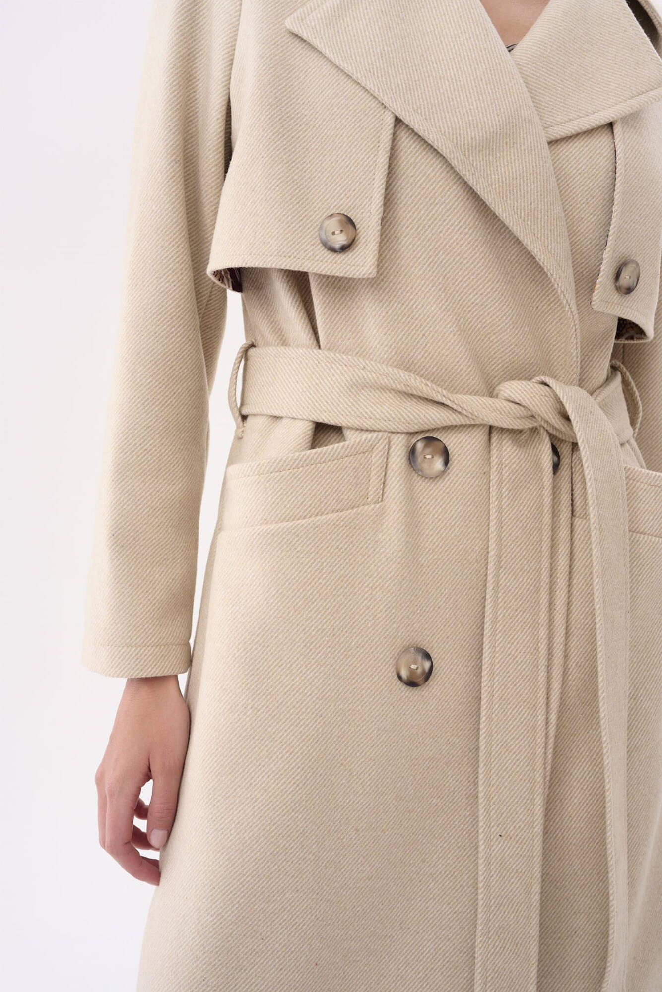 Beige double-breasted coat with Blue Shadow belt
