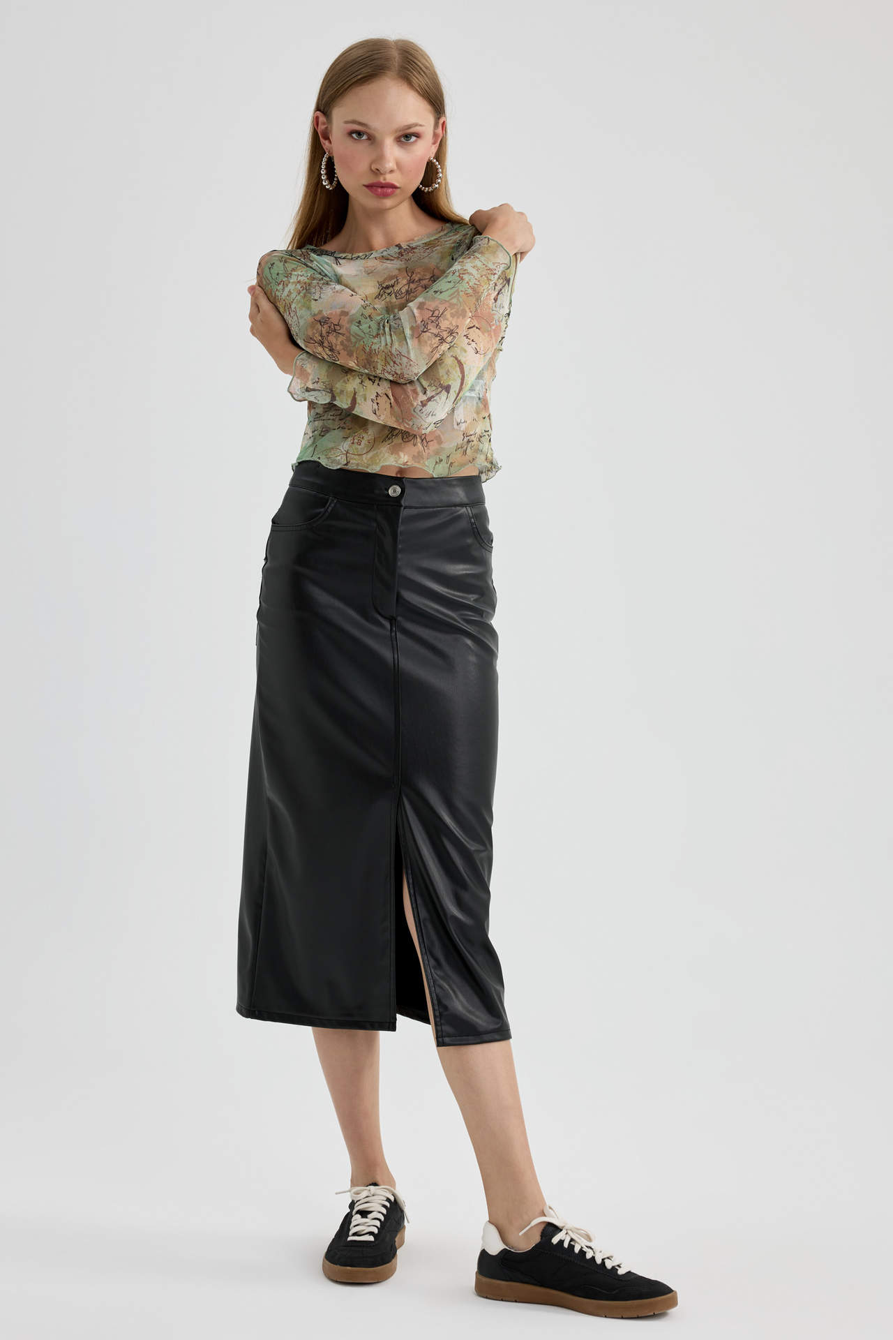 Levně DEFACTO Faux Leather Midi Knitted Skirt