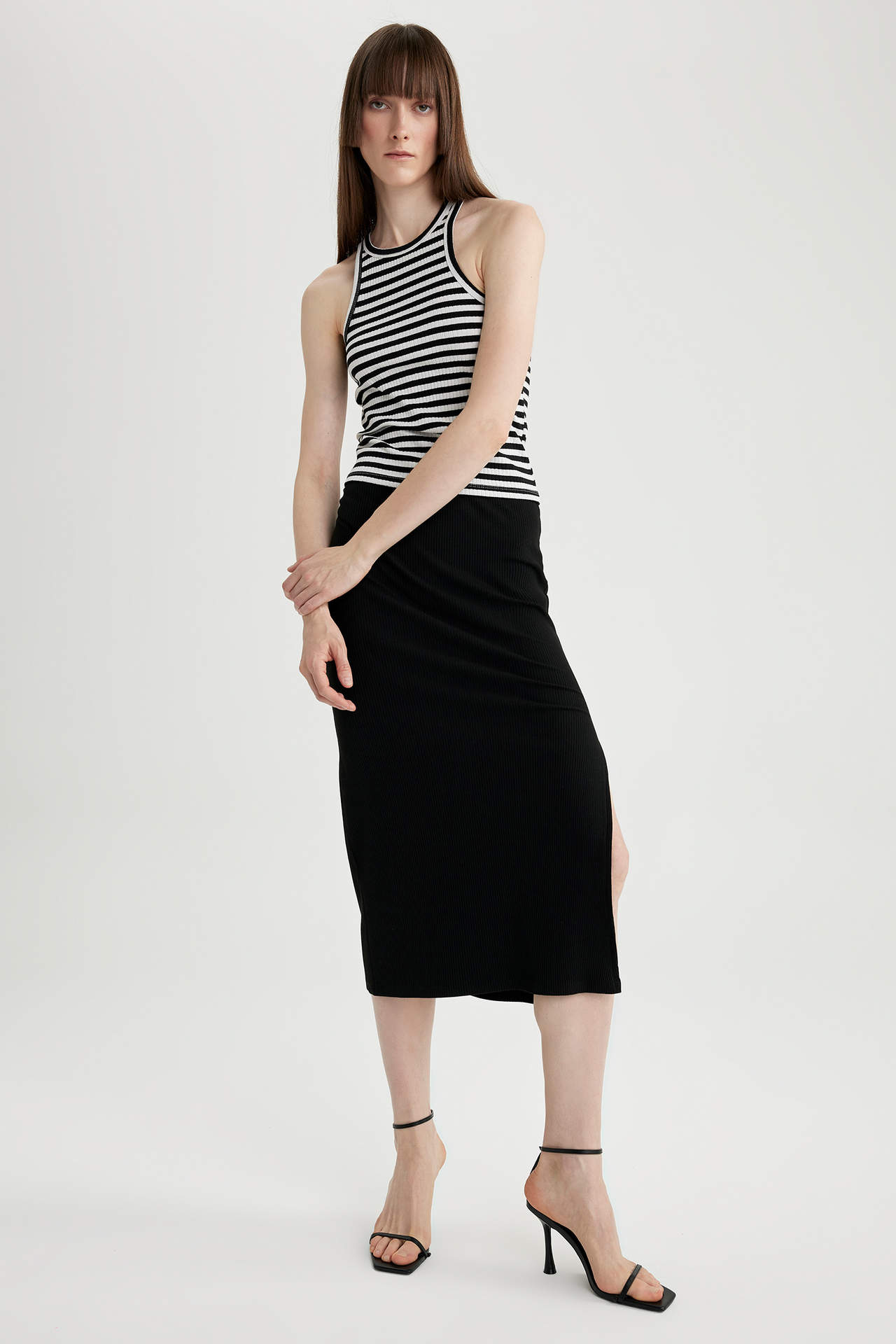 Levně DEFACTO Straight Fit Normal Waist Ribbed Camisole Midi Skirt