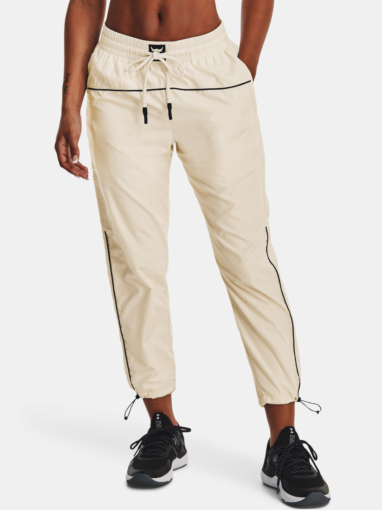 Krémové dámske nohavice Under Armour
