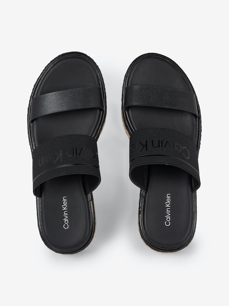 Black women&#039;s slippers by Calvin Klein