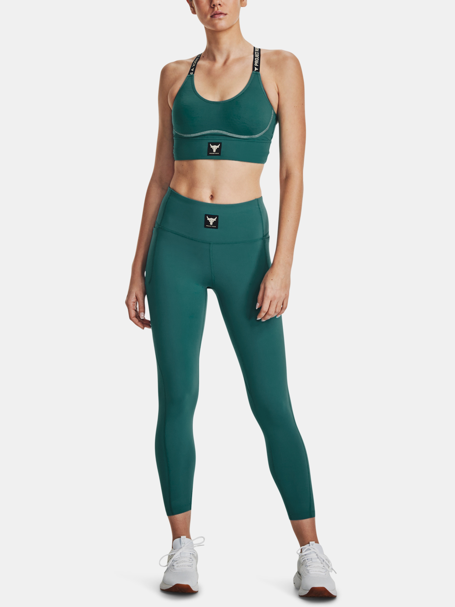 Nohavice a kraťasy pre ženy Under Armour - zelená