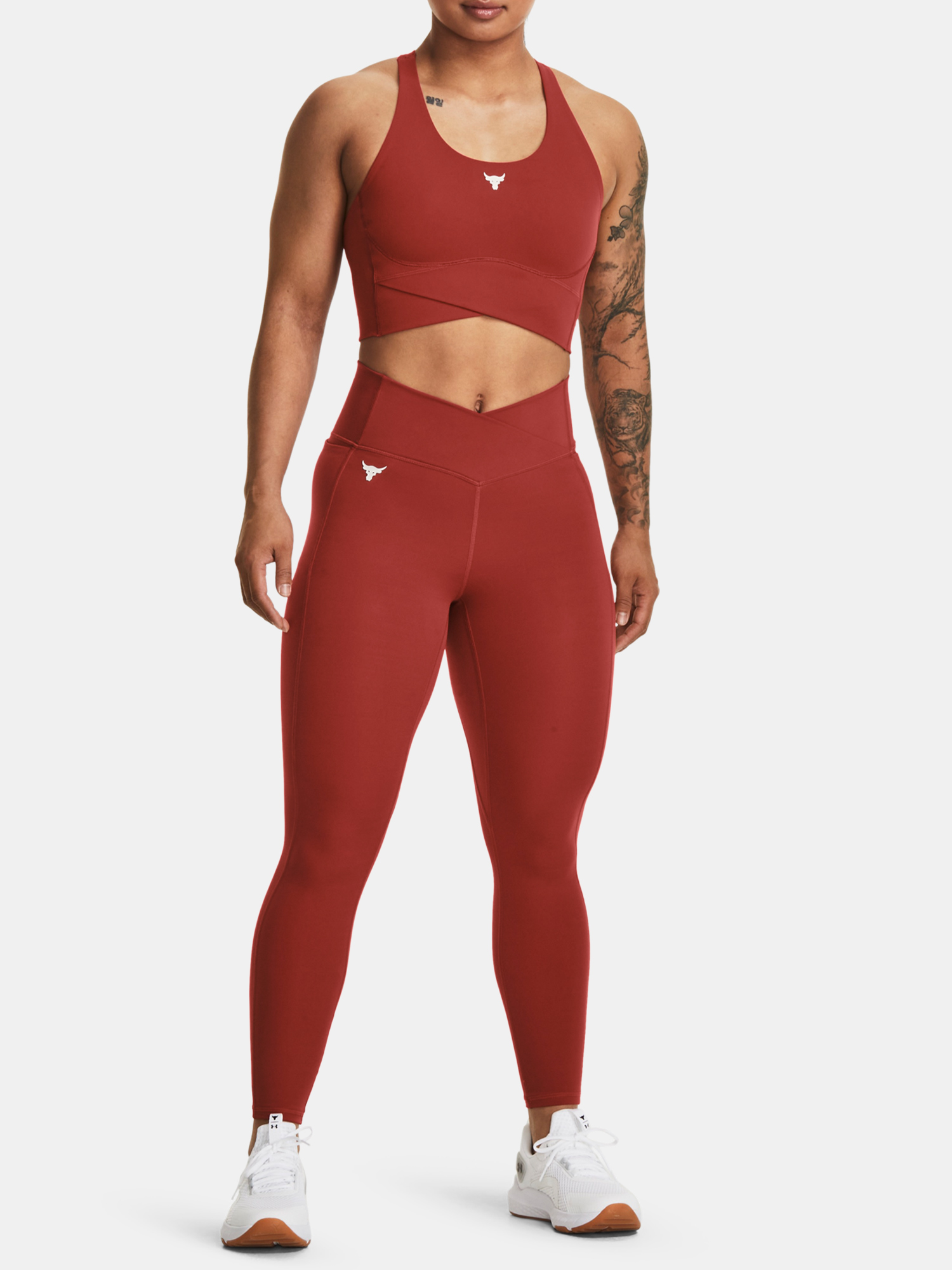 Nohavice a kraťasy pre ženy Under Armour - červená