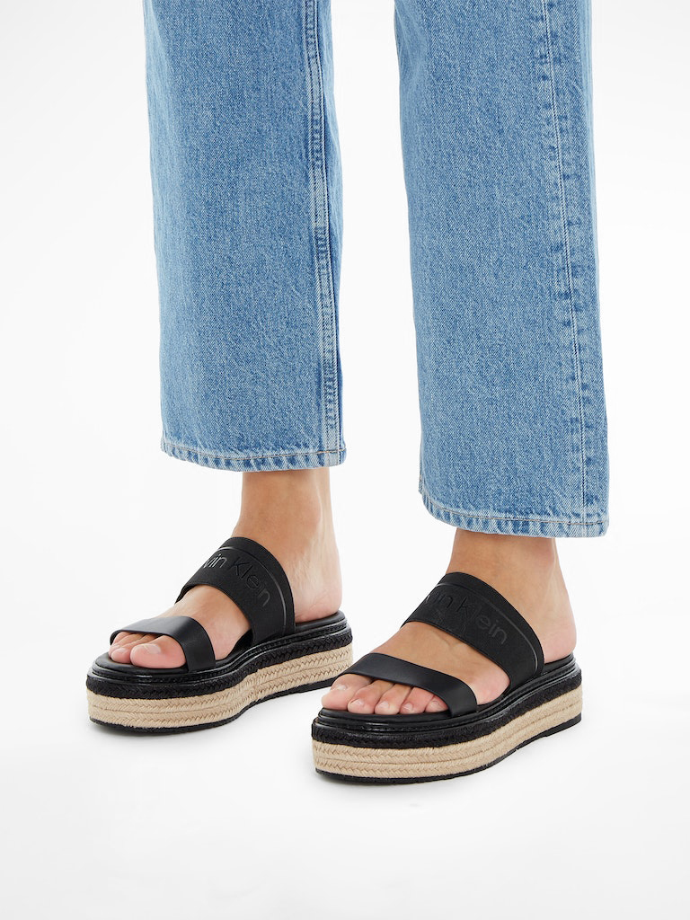 Black women&#039;s slippers by Calvin Klein
