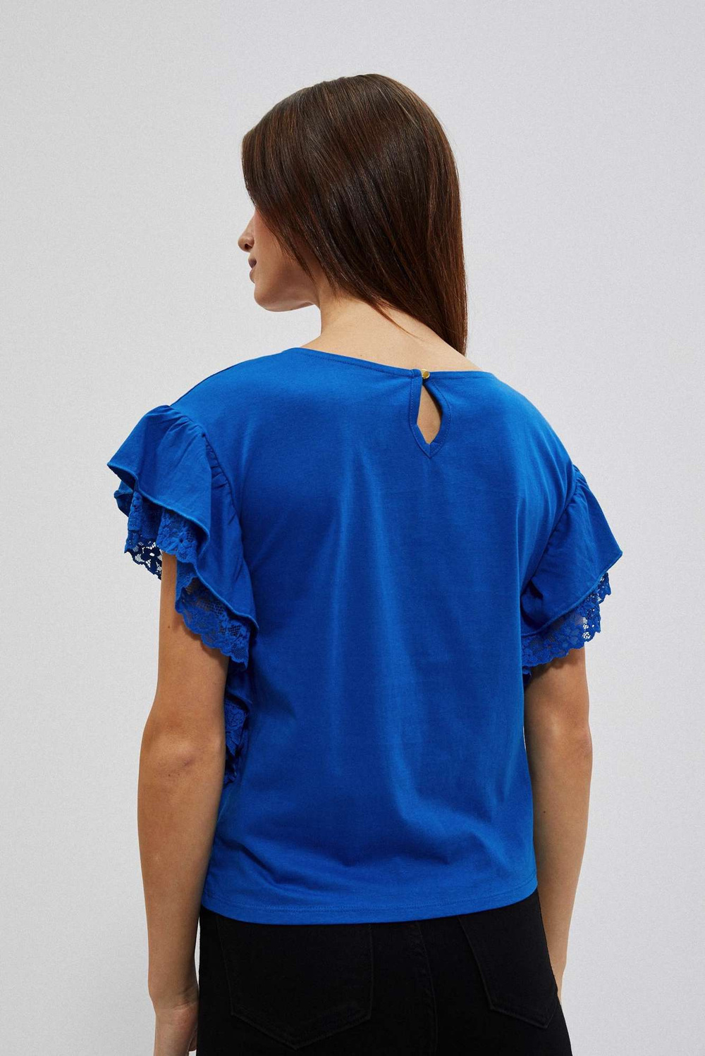 Blouse with ruffles on the shoulders