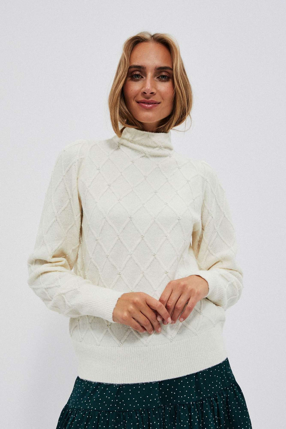 Turtleneck with geometric stitching