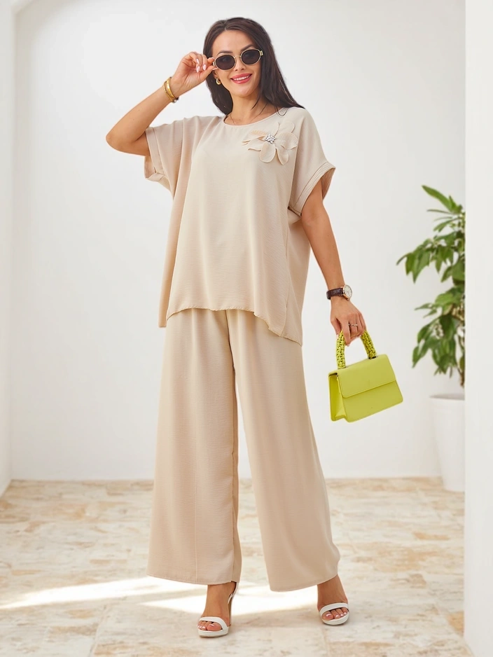 Resti Women's set with short sleeves, decorative flower, and wide pants