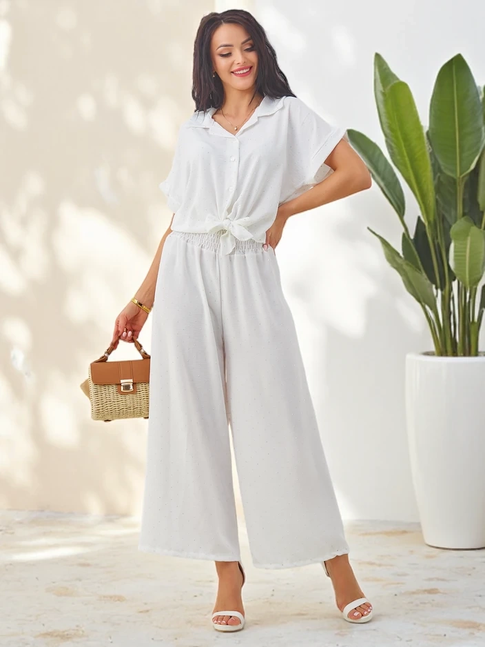 Resti Women's set with a tied short-sleeve shirt and flared pants with rhinestones
