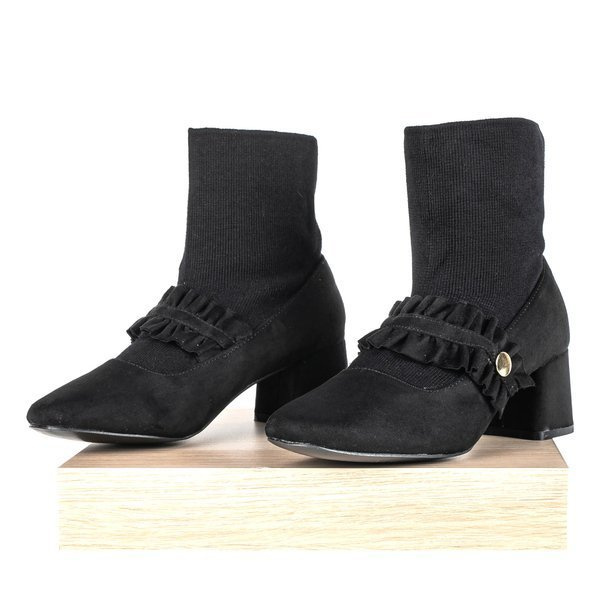 Resti Black pumps on a higher post with a Preciosa sock - Footwear