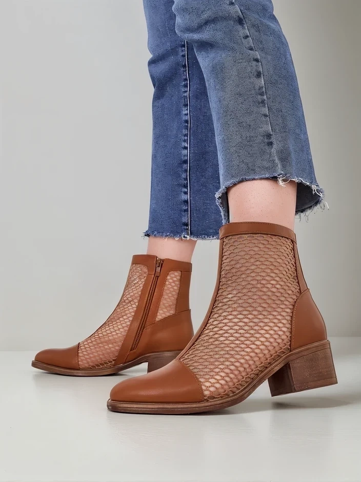 Resti Women's perforated ankle boots on a low heel Rowices