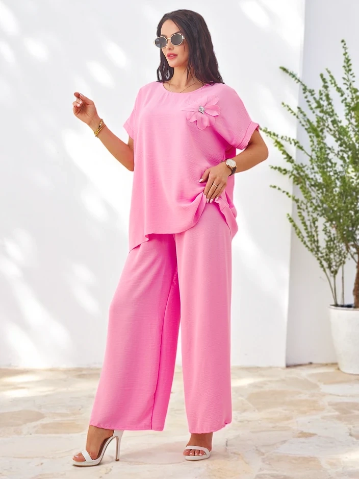 Resti Women's short-sleeved set with decorative flower and wide trousers