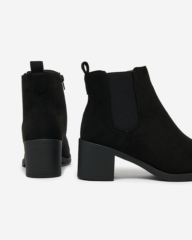 Resti Black eco-suede women&#039;s boots on a post Nanhelyna