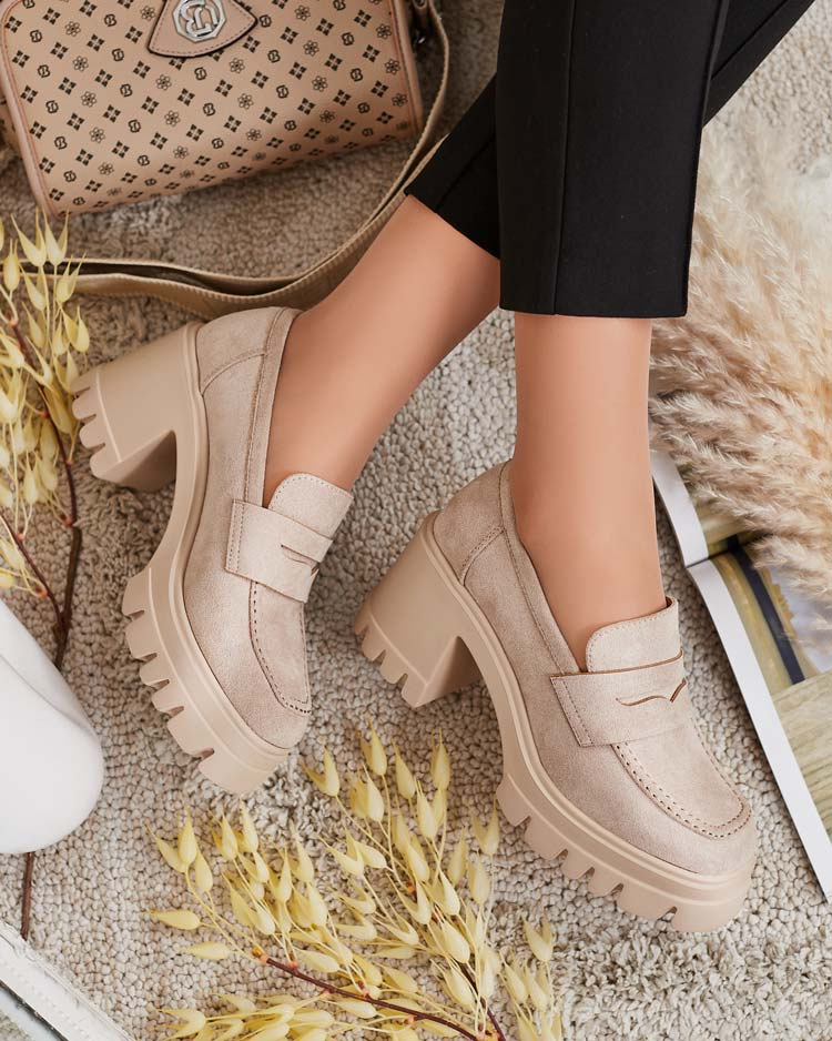 Resti Women&#039;s moccasins on a post Narvoti