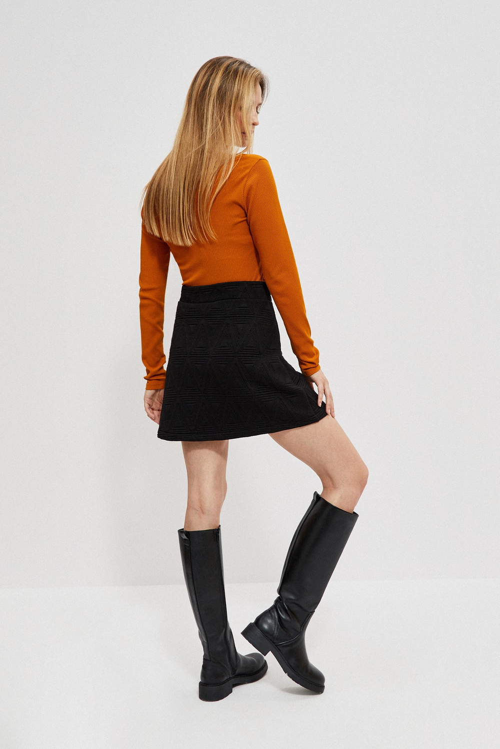 Mini skirt with geometric embossing